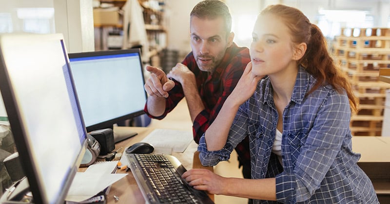 Office managers working with software